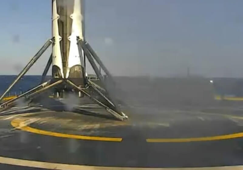 SpaceX makes history, successfully lands reusable rocket on drone ship for the first time