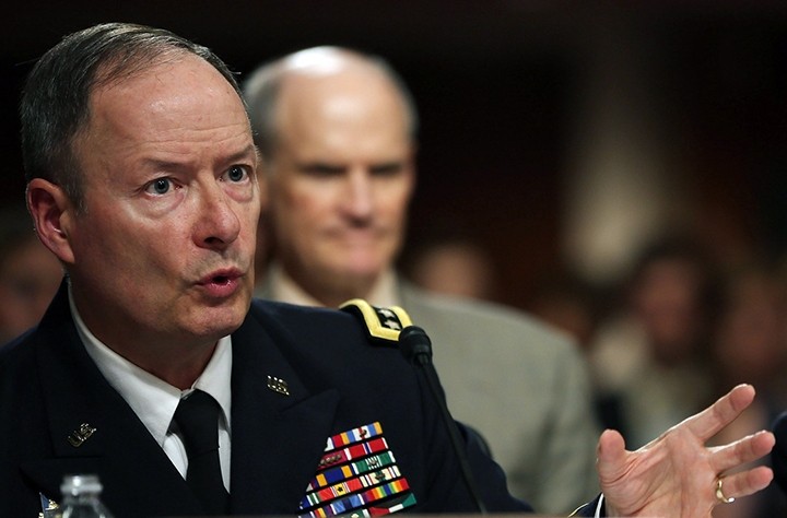 NSA director says programs prevented dozens of attacks; public opinion on surveillance, Snowden mixed