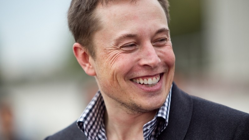 apple tim cook tesla acquisition electric car elon musk shareholders auto industry