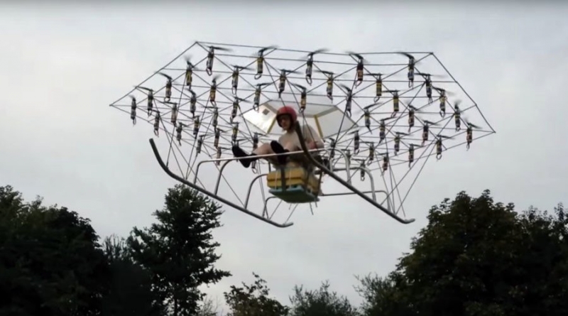 Man builds flying machine using 54 drone propellers and a garden chair