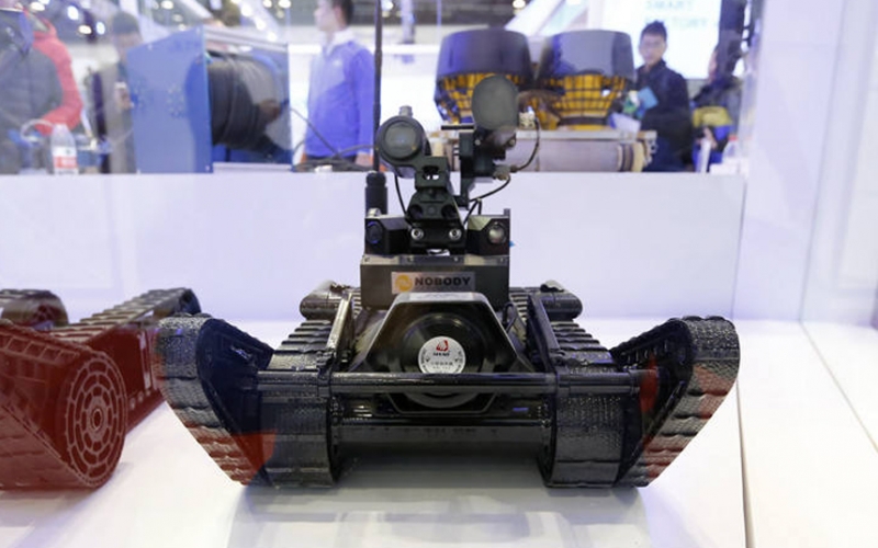 China shows off trio of new robots, one armed with guns and grenades, to help fight global terror