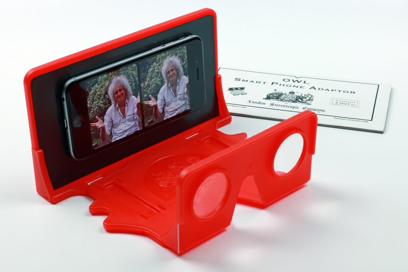 Queen guitarist Brian May shows off his plastic VR viewer that works with any smartphone
