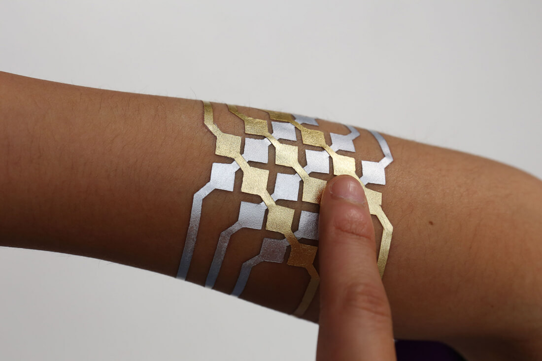 MIT and Microsoft create gold leaf temporary tattoos that can control devices