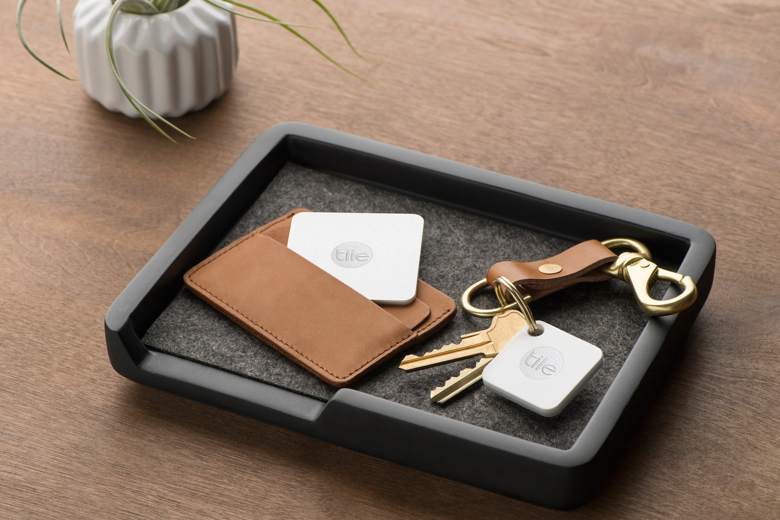 Mate is a thinner, lighter version of Tile's original Bluetooth tracker