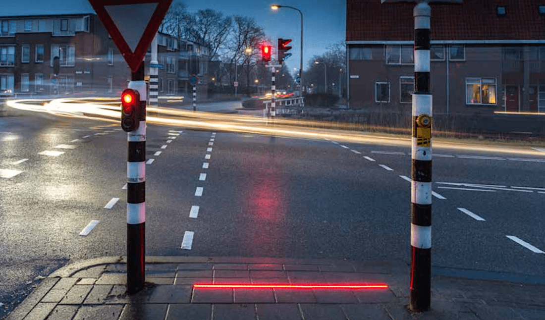 Sidewalk traffic lights designed for smartphone addicts appear in another location; this time they're bigger and brighter