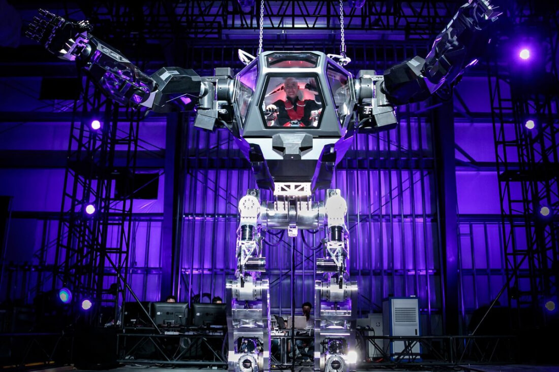 CEO Jeff Bezos pilots 13-foot mech at Amazon conference