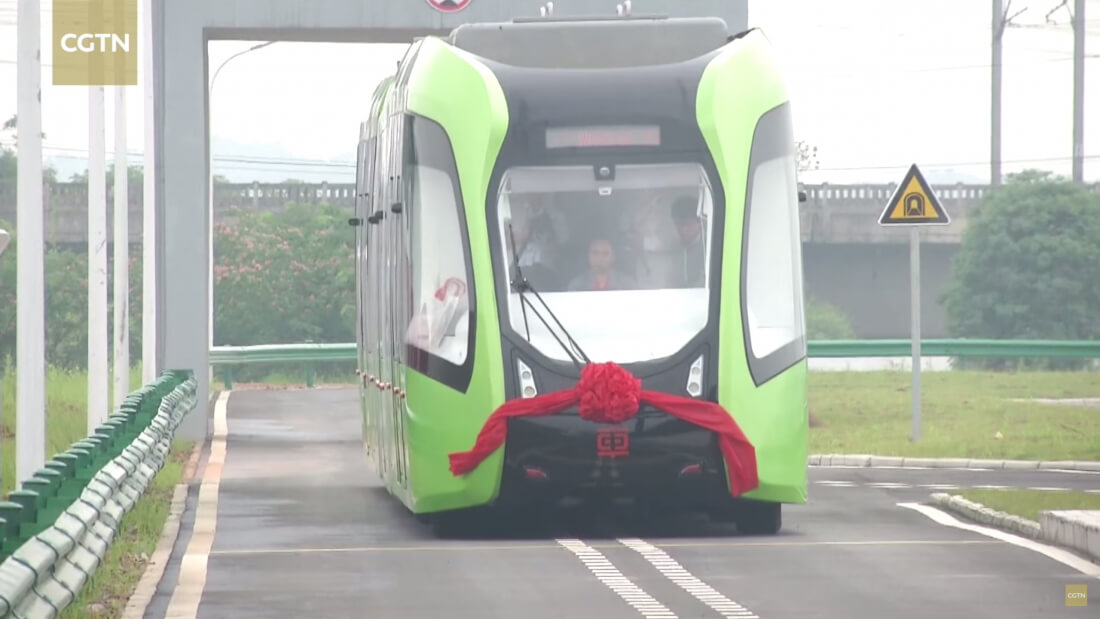 China unveils electric road train that runs on painted tracks