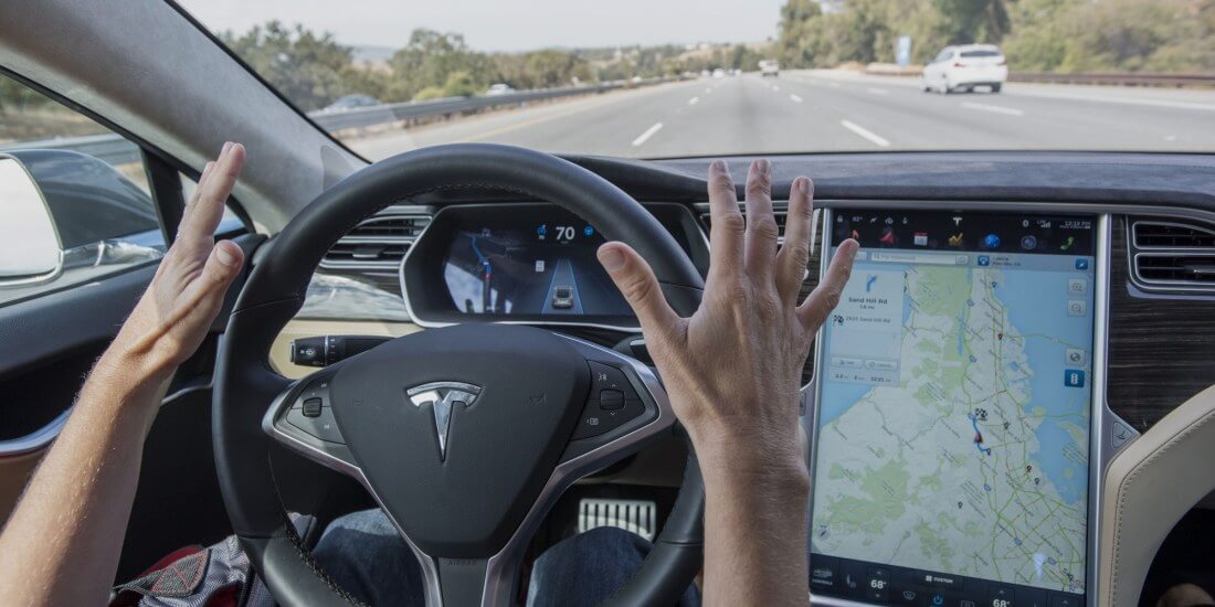 Another video appears to show a Tesla driver asleep behind the wheel