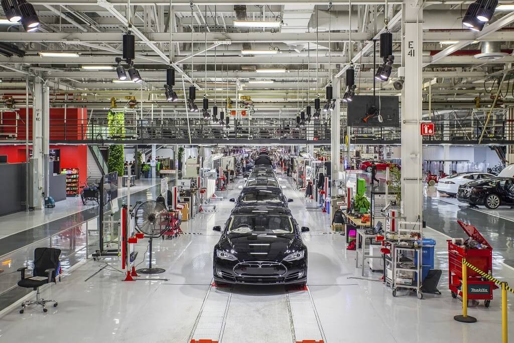 Elon Musk says Tesla workers will be sleeping on the factory floor when new $25,000 EV goes into production next year
