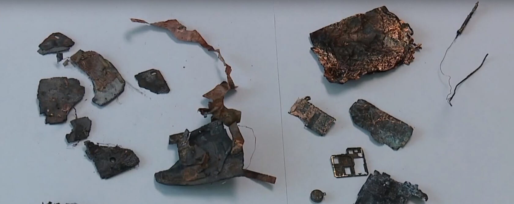 Woman says her Samsung phone exploded, started fire that destroyed car