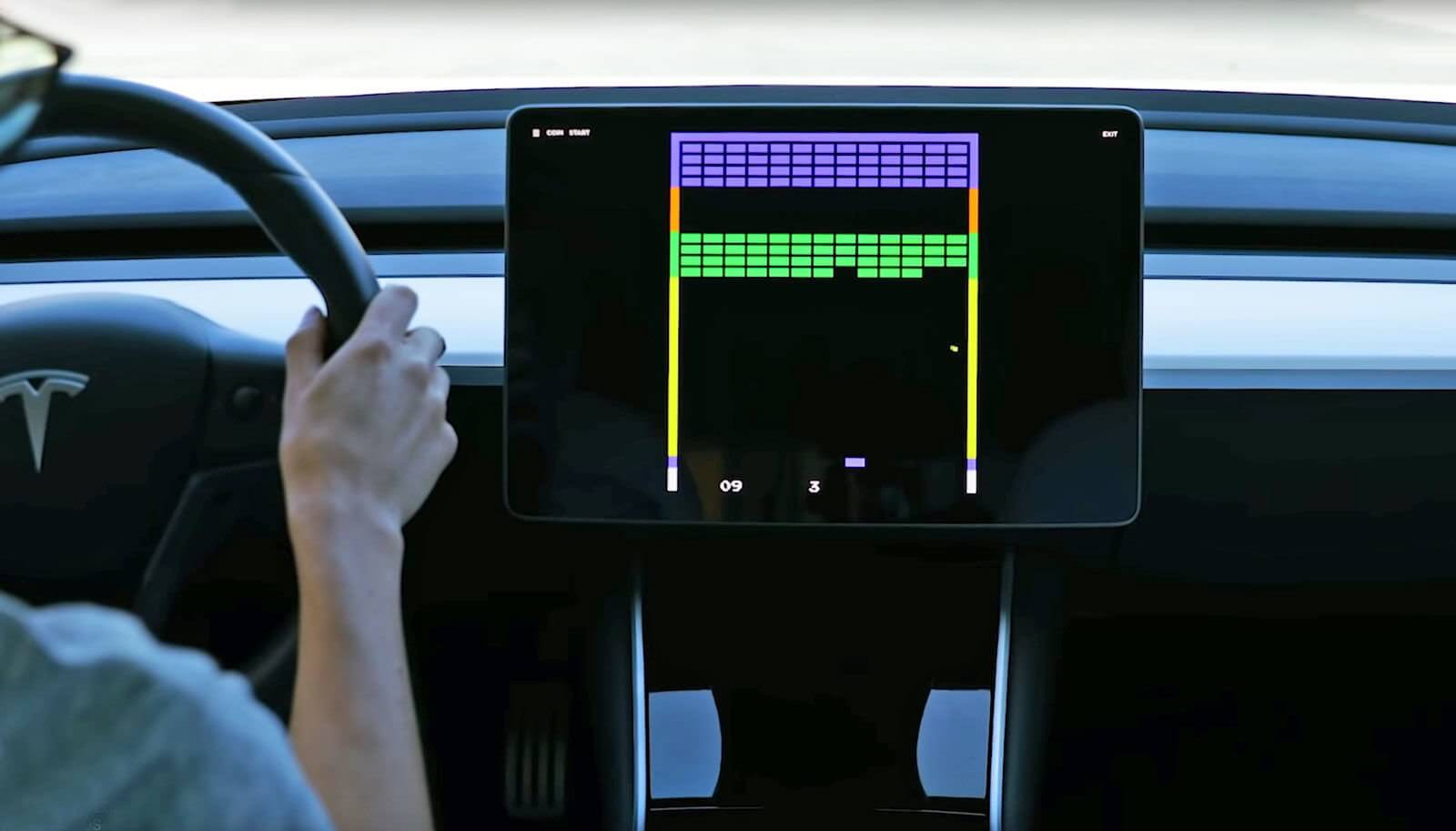 Tesla begins rolling out '2048' and 'Super Breakout' to customer vehicles