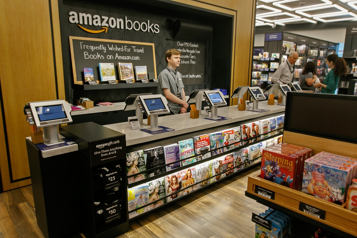 Amazon CEO Jeff Bezos challenges top retail rivals to increase their minimum wages