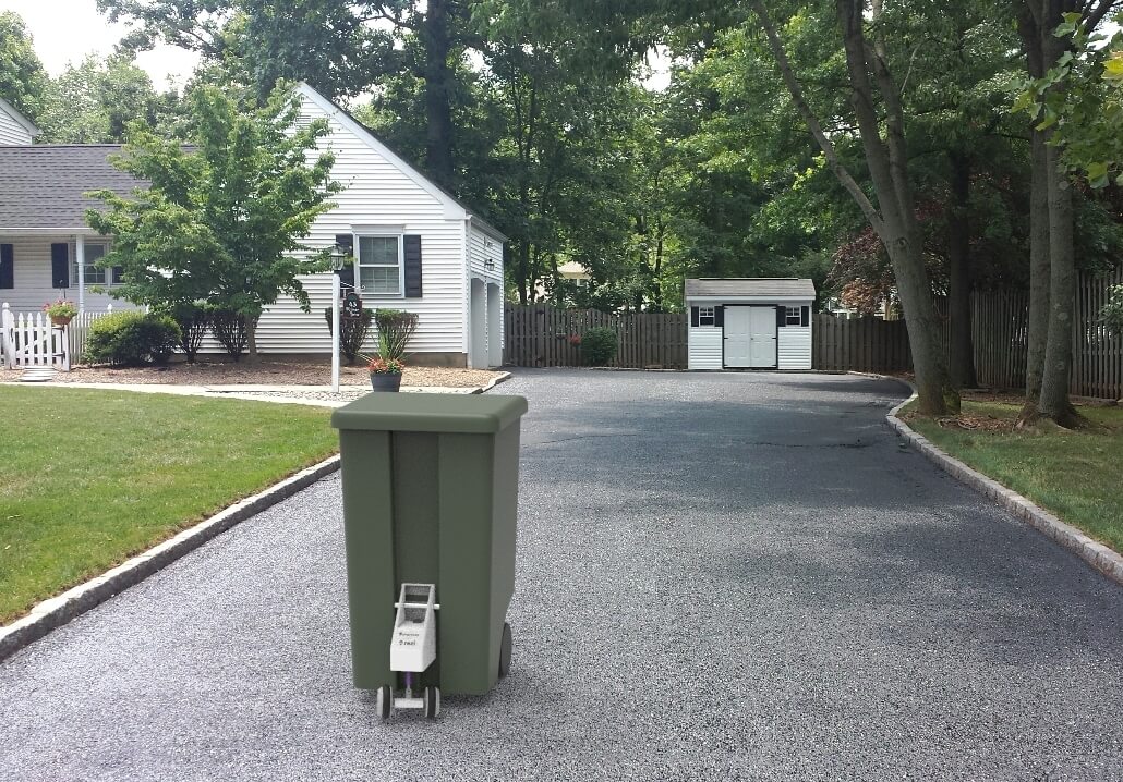 SmartCan hauls your garbage to the curb on pick-up day