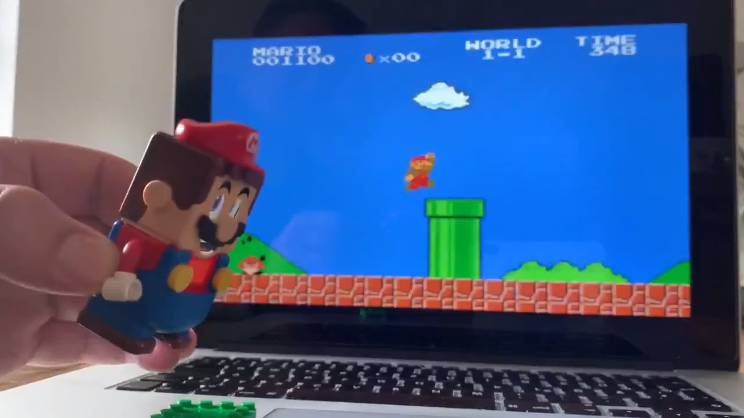 Watch Lego Mario controlling digital Mario