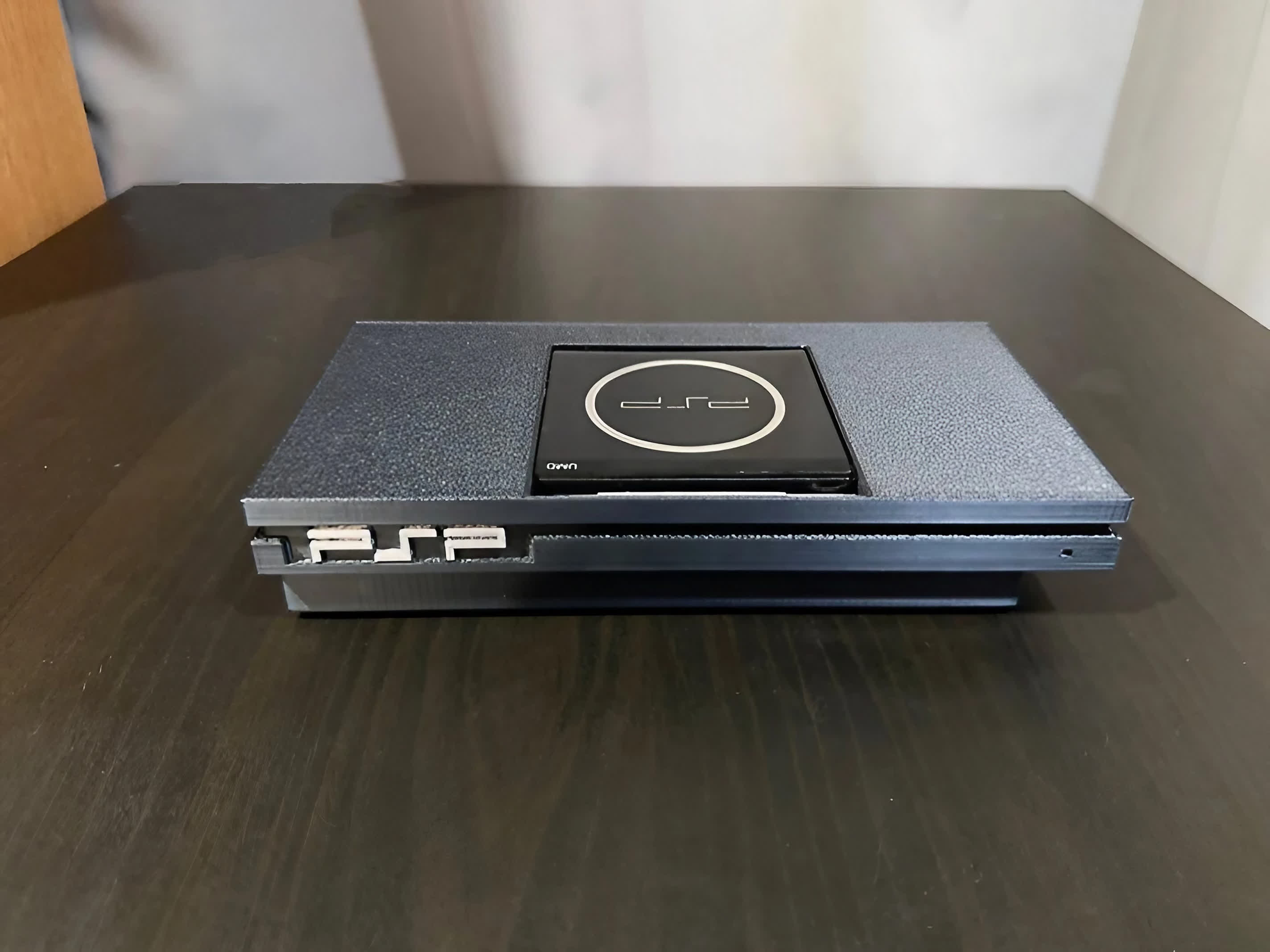 This cute mod turns the Sony PSP into a PlayStation 2