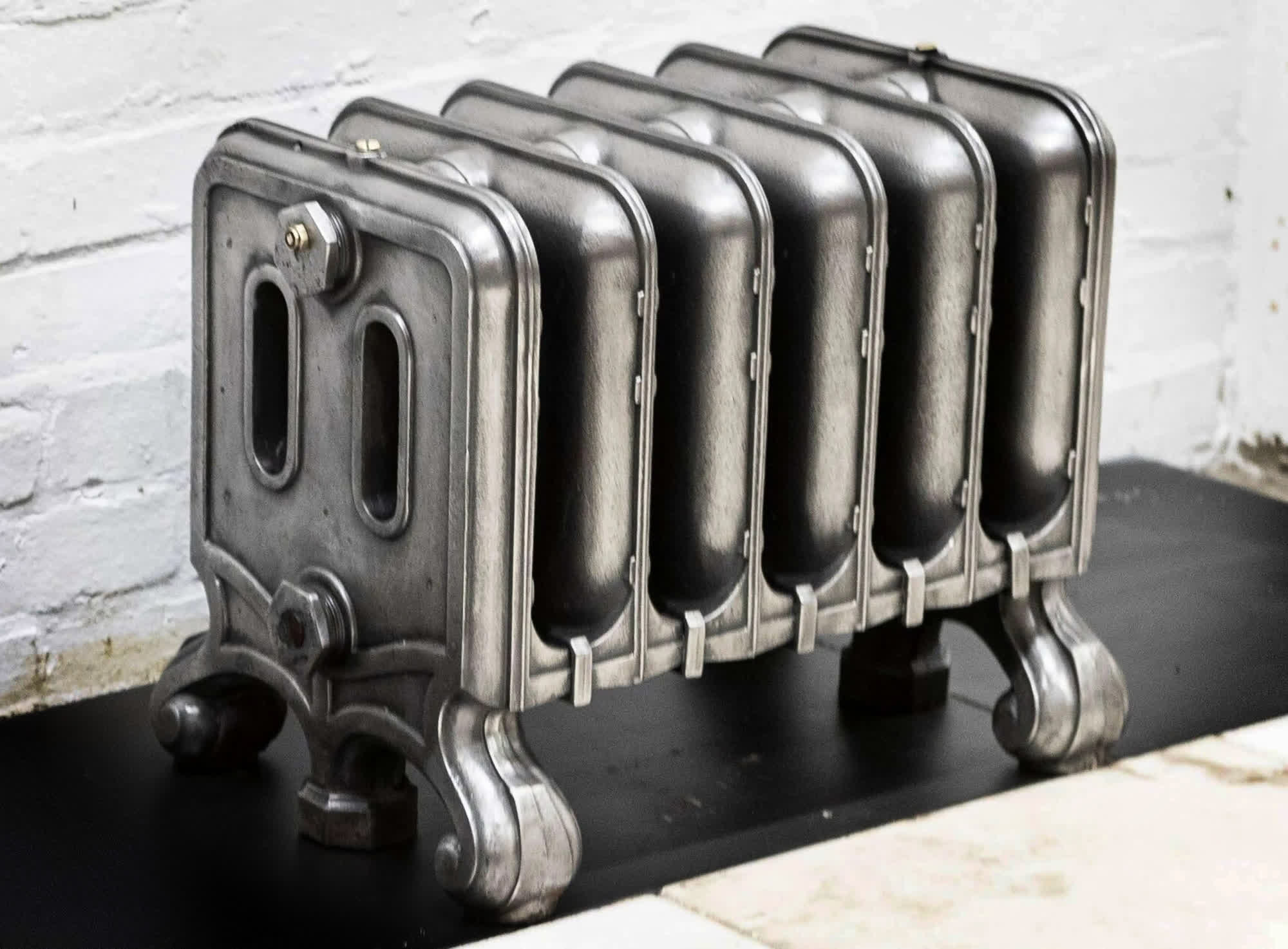 Modder uses century-old cast iron radiator to chill modern PC