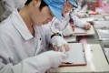 apple audit reveals cases underage labor china apple child labor audit
