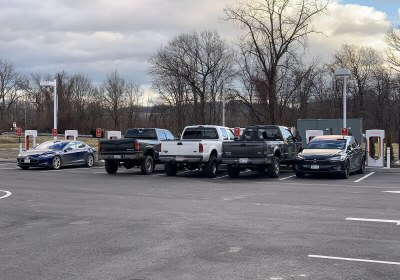 tesla-hating model tesla charging stations protest