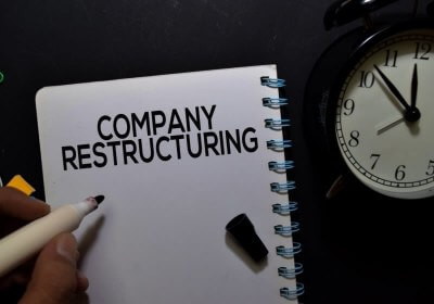 groupon restructuring