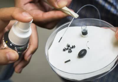 researchers with video magnets robotics