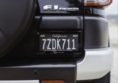 researcher hacking digital license plate
