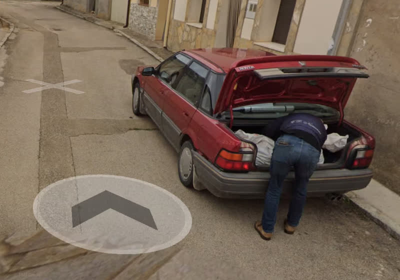 Google Street View shot of man allegedly stuffing body into car helps ...