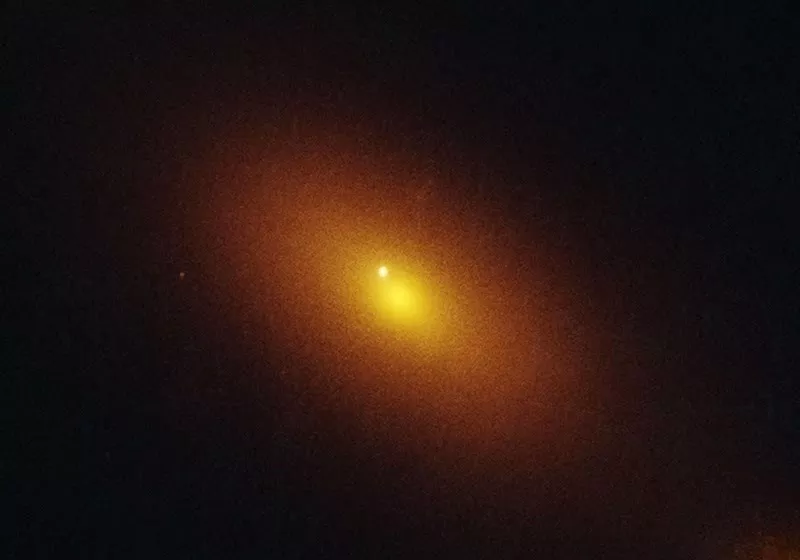 Wandering supermassive black hole spotted devouring star