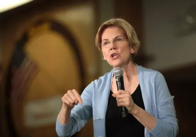 elizabeth warren energy taxes proposal data center